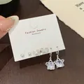 6-piece silver earring set featuring sparkling star charms, butterflies, and white pearls - Butterfly Star Style