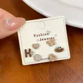Set of 6 cute brown cartoon panda and heart stud earrings on display card - Smiley Face Expression (AXT5)