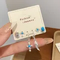 Bohemian silver sun flower and blue turquoise stud earring set for women - Cross Wings Style (YYT1)