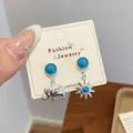 Bohemian silver earrings with turquoise inlay, featuring elephant and sun star charms - Elephant Sun Style (YYT5)