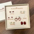 Set regalo da 7 giorni di orecchini in argento assortiti in stili vari ed eleganti - Stile Rosso Festivo (CK102)