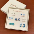 Set di 7 paia di orecchini blu con stelle e fiocchi in confezione regalo settimanale - Stile Stella Blu Invernale (CK106)