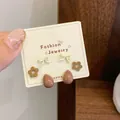 Three-piece set of cartoon brown panda-themed stud earrings featuring bow and flower motifs - Water Drop Flower (LJT3)
