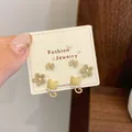Three-pair set of cute brown cat, flower, and bow stud earrings with resin finish - Cat Flower (LJT6)