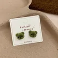 Cute green flocked bear stud earrings for women with soft plush texture and silver needles - Bear Head / Green