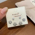 Three-pair silver snowflake earring set with micro-set zircon and white pearls - Full Zirconia Pearl Snowflake Earring Set