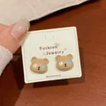 Cute brown cartoon bear stud earrings with glossy enamel finish on display card - Bear Head with Pink and Blue Eyes (KTW40)