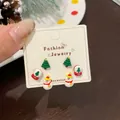 Christmas stud earring set featuring green tree, snowman, and snowball holiday designs - Tree Snowman