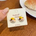 Cute cartoon cat earrings with yellow hats on a display card for daily wear - Cat with Yellow Sleeping Hat (KTW44)
