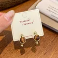 French vintage amber tiger eye stone earrings with golden metallic round frames - Gold Amber Round Ball (UJ5)