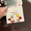 Christmas stud earring set featuring reindeer, gingerbread man, and holiday icons - Elk Gingerbread Man