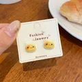 Cute cartoon orange cat stud earrings with glossy enamel finish on a display card - Orange Spotted Cat (KTW47)