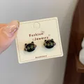 Cute black cat stud earrings with brown headphones and yellow eyes on white card - Black Gaming Cat (KTW49)