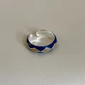 Detailed macro shot of vintage enamel diamond pattern on a silver adjustable open ring - Silver Base Blue Background Brown Yellow Rhombus (Style 1 Ring)