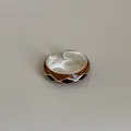 Macro detail of silver adjustable ring featuring brown and black enamel diamond patterns - Silver Base Brown Black Rhombus (Style 3 Ring)