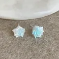 Macro shot of blue gradient rose resin stud earrings with a subtle pearlescent shimmer - Blue Rose