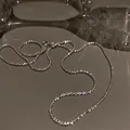 Elegant shimmering silver clavicle chain necklace on a mirror tray for women - Shimmering Silver Fine Chain