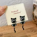 Asymmetric black cat earrings with velvet stars and white paw pads for women - Cat Tail Earrings (MMW9)