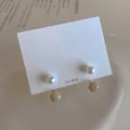 Detail of freshwater pearl earring with 925 silver needle and paved zircon sphere - 925 Silver Post Gold Plated / Cubic Zirconia Earring Style