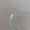 Detalle de collar de cuentas plateadas con cadena ajustable y cierre de langosta - Cadena de Cuentas de Metal Continua / Estilo de Cadena de Frijoles - Dorado
