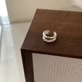 Detail of S925 sterling silver ear cuff with irregular hammered texture and smooth band - Double Layer Irregular Style / Real Gold Plated