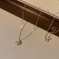 Collier minimaliste en argent S925 avec un pendentif en perle d'eau douce ronde - Or