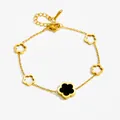 Damen-Armband aus goldfarbenem Edelstahl mit schwarzen Fünfblatt-Blütenanhängern - Schwarz Weiß Fünf Blumen Armband (5399)