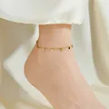 Elegante tobillera de acero de titanio dorado con discos redondos planos para mujer - Tobillera / Dorado