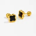 Detailed macro view of gold clover stud earrings with black inlay and screw-back closure - Four-Leaf Clover