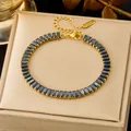 Elegantes vergoldetes Edelstahl-Tennisarmband mit rechteckigen schwarzen Zirkonsteinen - Armband / Vergoldetes Schwarzes Zirkon-Armband