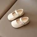 Cream Mary Jane shoes for girls featuring a square rhinestone buckle and a round toe - EU 21 / Beige