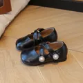 Girls' black patent Mary Jane shoes with crisscross straps and pearl flower accents - 21 / Black