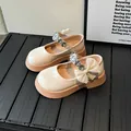 Zapatos Mary Jane de charol crema para niñas con diamantes de imitación y lazo grande - EU 27 / Beige