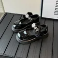 Zapatos Mary Jane para niña en charol negro con tira floral de strass y detalle de lazo - EU 27 / Negro