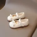Elegant beige girls Mary Jane shoes with a decorative bow and easy velcro strap closure - 21 / Beige