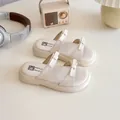 Sandales compensées beiges pour filles avec d'élégants doubles nœuds décoratifs - EU 26 / Beige