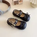 Mattschwarze Mary Jane Mädchenschuhe mit Schleifendekor und verstellbarer Gold-Schnalle - EU 21 / Schwarz