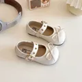 Elegante cremeweiße Mary Jane Schuhe für Mädchen mit Schleife und goldener Schnalle - EU 21 / Beige