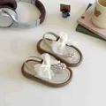 Girls cream sandals with mesh bow and pearl floral detail on a comfortable brown sole - EU 21 / Beige