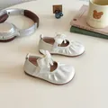 Creamy white Mary Jane shoes for girls featuring satin bow and pearl details - 16 / Beige