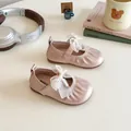 Pink satin Mary Jane flats for girls featuring a large mesh bow and pearl cross detail - 16 / Pink