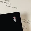 Macro detail of ice cream stud earring with pink heart gemstone and micro-pave crystals - Ice Cream Style (5506020064606)