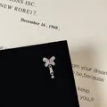 Detail of silver bow cartilage stud with pink zircon and screw ball back design - Bowknot Pendant Style (5506020064607)