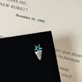 Macro view of blue star gem and white enamel screw back stud with pavé zircon stones - Blue Star Enamel Style (Style 3 Cartilage Stud)