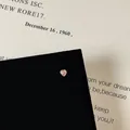 Macro shot of pink heart zircon stud earring with screw back on vintage paper background - Exquisite Pink Heart Prong Style (5506020064637)