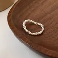 Elegante anello a stella con perle bianche e perline di cristallo sfaccettate - Stile a Perline Perla d'Imitazione