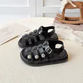 Black leather gladiator sandals for girls with silver sun-flower studs and thick soles - EU 26 / Black