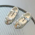 Sparkly silver girls Mary Jane princess shoes with sequin bow on a textured glass surface - EU 34 / Silver