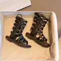 Fashionable black Roman style high-top girls sandals with cross straps and side zipper - EU 21 / Black