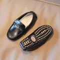 Black leather loafers for kids featuring green stripe webbing and silver metal buckle - EU 21 / Black